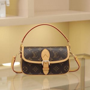This Diane mini handbag features vintage elements like leather corners and a traditional buckle on its Monogram canvas body. A miniature version of the Diana model, it offers ample space for your phone and other essentials. It showcases the most distinctive details of the original design, such as the circular flap and belt closure. This versatile piece, perfect for day or night, features adjustable wings and a waist strap, both of which are removable.19 x 10.5 x 6 cm (L x H x W)